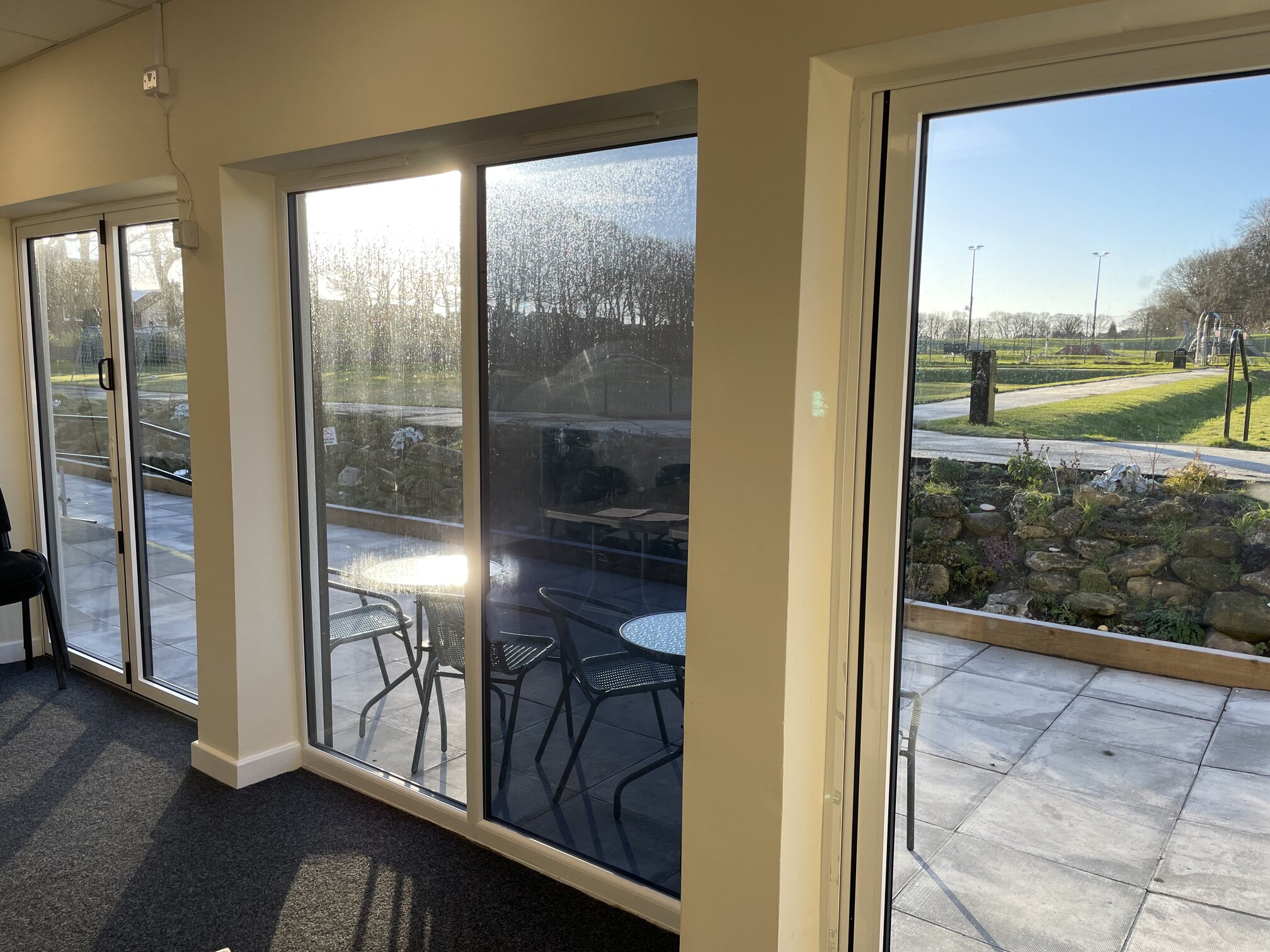 Frosted privacy film on patio doors and internal glazing