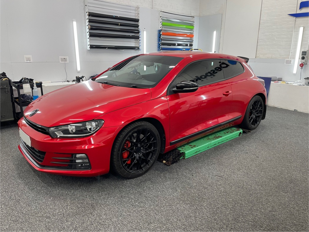 Red Volkswagen Scirocco detailed in the Bespoke Vinyl workshop